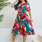 Plus Size Printed Round Neck Tie Belt Dress